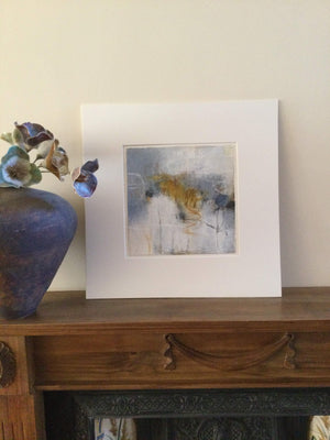 Amber, Grey, White acrylic and collage artwork by London visual artist Carol Edgar displayed in an off white mount