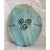Mirror Eye Cowrie Mouth Stoneware clay wall piece with dry sky-blue glaze by Corrine Edwards South London ceramic artist