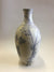 Handmade stoneware vase with cobalt oxide sgraffito decoration depicting umbellifer wild flowers