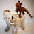 Fox Leap Frogging Over Sheep by Vivien Phelan ceramic artist.