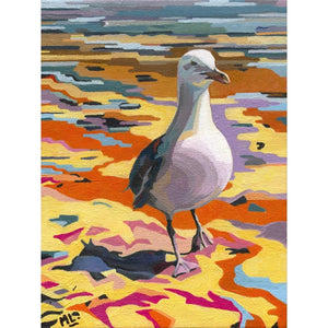 A fine art print of a seagull standing on colourful sand, depicting abstract tones in orange, yellow, and other colours by Mary Leach.