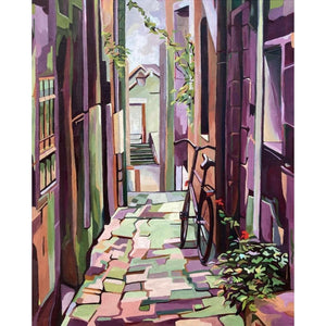 A vibrant fine art print depicting a narrow street with cobbles, bicycles, and buildings, characteristic of a French back alley by Mary Leach.