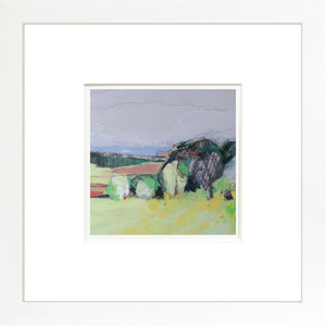 Framed painting of a landscape with trees and fields.