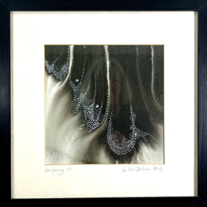 A close up of a framed WHISPERING II original artwork using acrylic inks by London based artist Linda Jenkins
