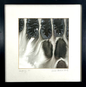 A close up of a framed WHISPERING III original artwork using acrylic inks by London based artist Linda Jenkins
