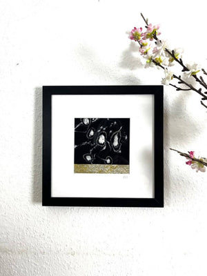 DANCING I mixed media original artwork using monotype print with embroidery by London based artist Linda Jenkins framed and hanging on a wall