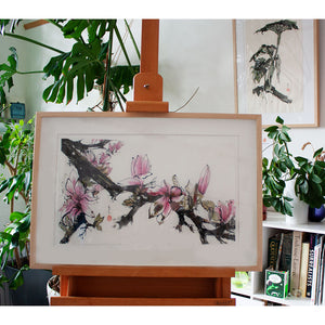 An original ink on paper artwork of pink magnolia flowers by artist Judy Head framed