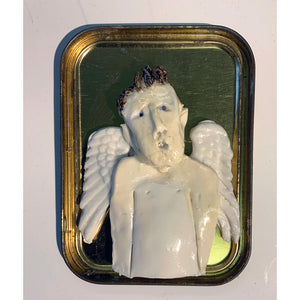 Ceramic guardian angels housed in a tobacco tin by mixed media artist Heather Tobias