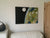 Above and Beyond a textured painting on canvas by Gill Hickman of Planet Earth hung in a room setting