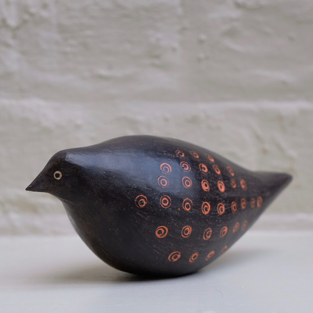 Blackbird I hand built one of a kind black stoneware bird with incised orange slip pattern by Caroline Nuttall-Smith