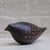Blackbird I hand built one of a kind black stoneware bird with incised orange slip pattern by Caroline Nuttall-Smith