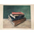 Books acrylic on canvas painting of a stack of books by Sarita Keeler