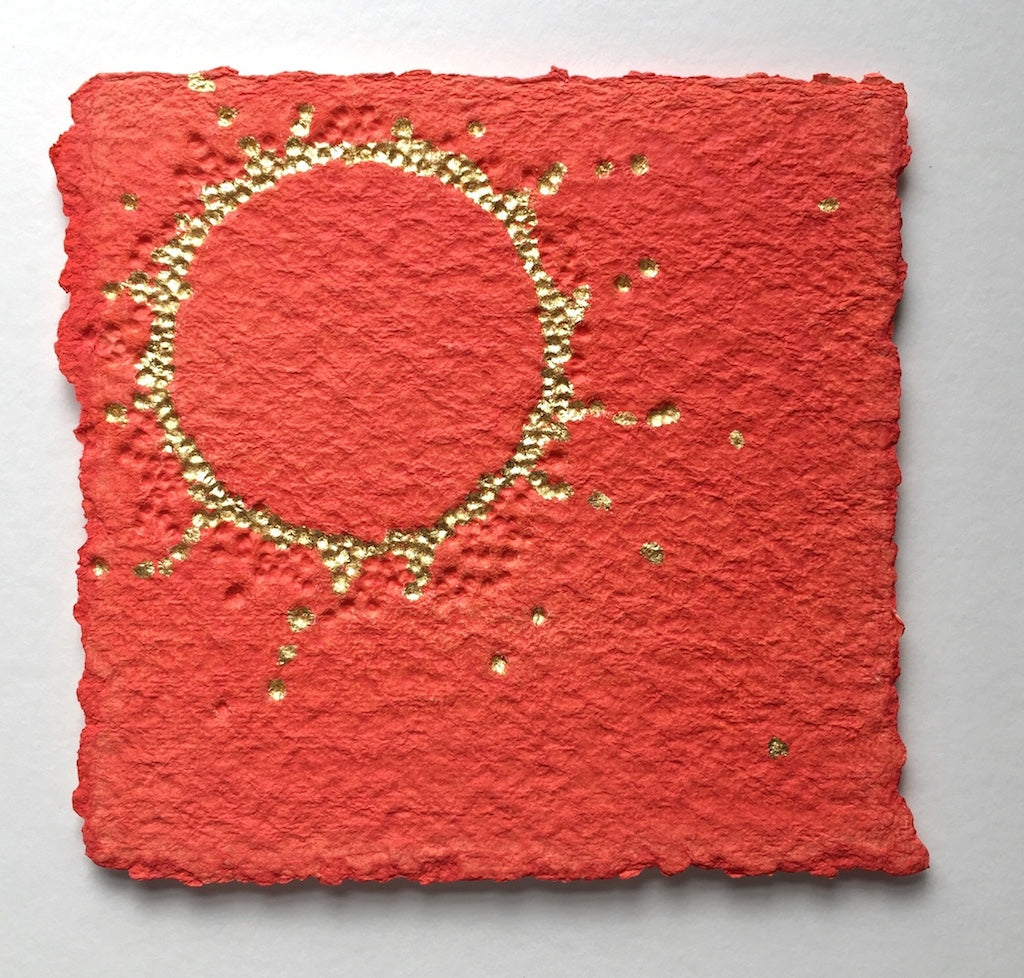 unique abstract artwork by London-based textural artist gill hickman, a textured golden circle floats on a background of bold orange