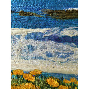Cliff Top View by Diana Mckinnon embroidery artist comprising blue sky, ocean and yellow coastal flowers detail of sea waves
