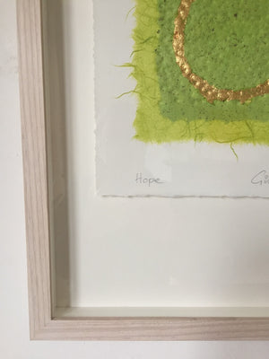 Hope original embossed collage in green with a circle in gold leaf by London textural artist Gill Hickman close up