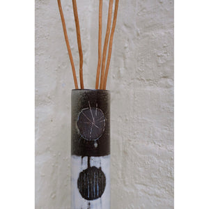 Incised Circles Vase by Caroline Nuttall-Smith one of a kind hand built black stoneware cylinder vase featuring incised clay slip line detail