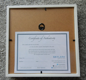 Back of image with Certificate of Authenticity