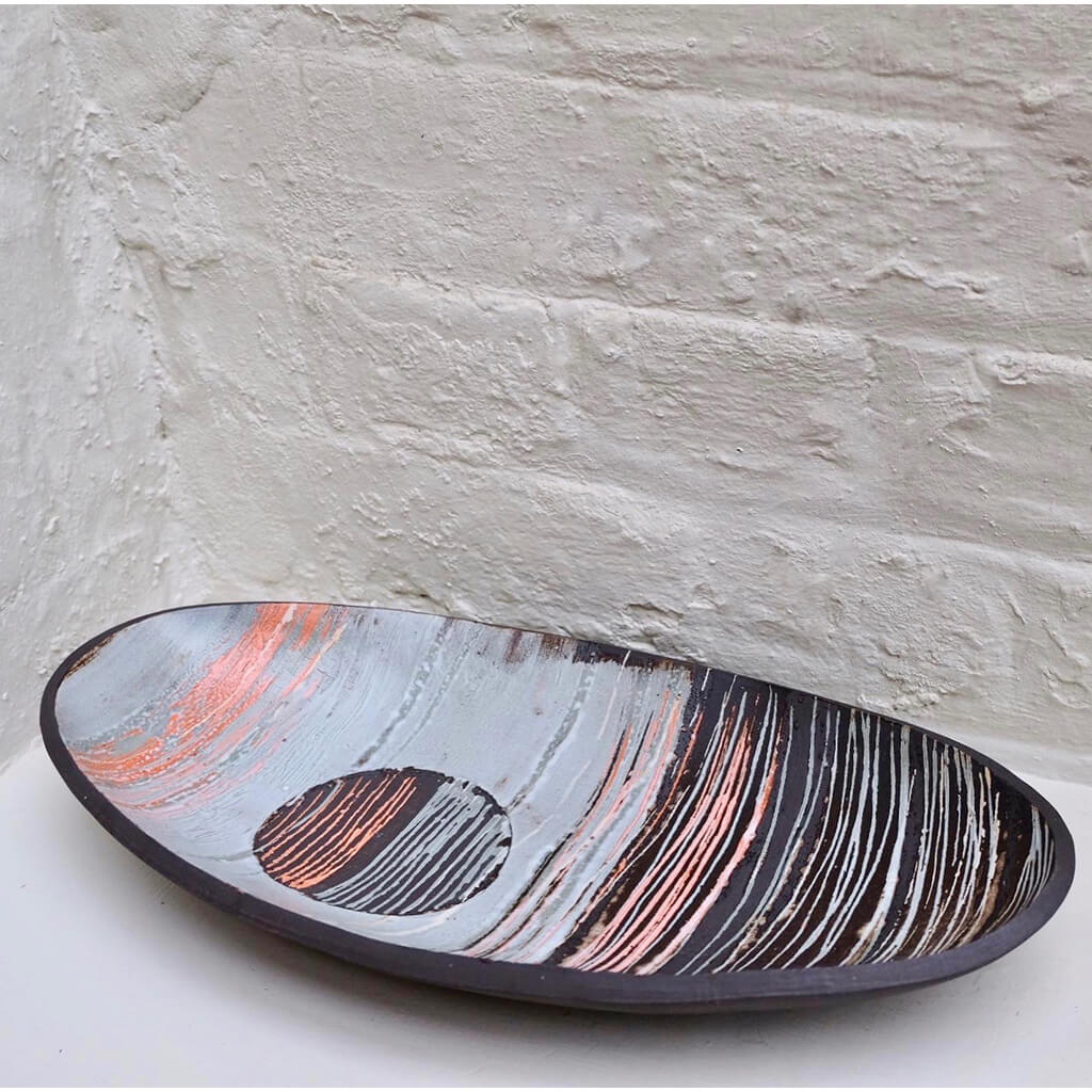 Mono Print Circle Oval Dish by ceramic artist Caroline Nuttall-Smith hand built, one-off black stoneware dish with mono printed clay slip