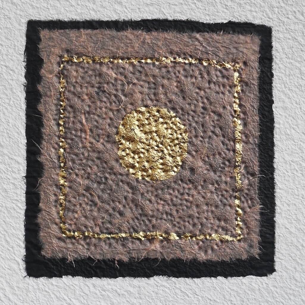 Safe and Sound abstract collage by textural artist Gill Hickman, a golden circle sits inside a golden square