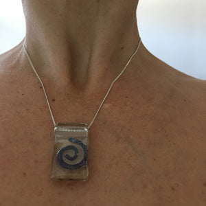 Spiral by Eryka Isaak glass pendant on sterling silver kerb chain necklace modelled