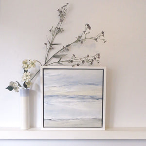 Tofino Seascape by Sarah Knight. An original semi-abstract oil seascape painted in shades of blue and grey framed in white wood