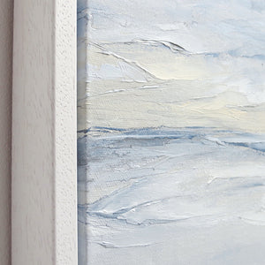 Tofino Seascape by Sarah Knight. An original semi-abstract oil seascape painted in shades of blue and grey framed in white wood close up
