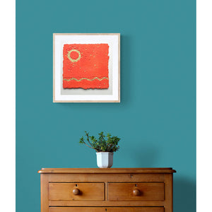 Totally Tropical by Gill Hickman a collage artwork in vivid orange and gold framed on wall