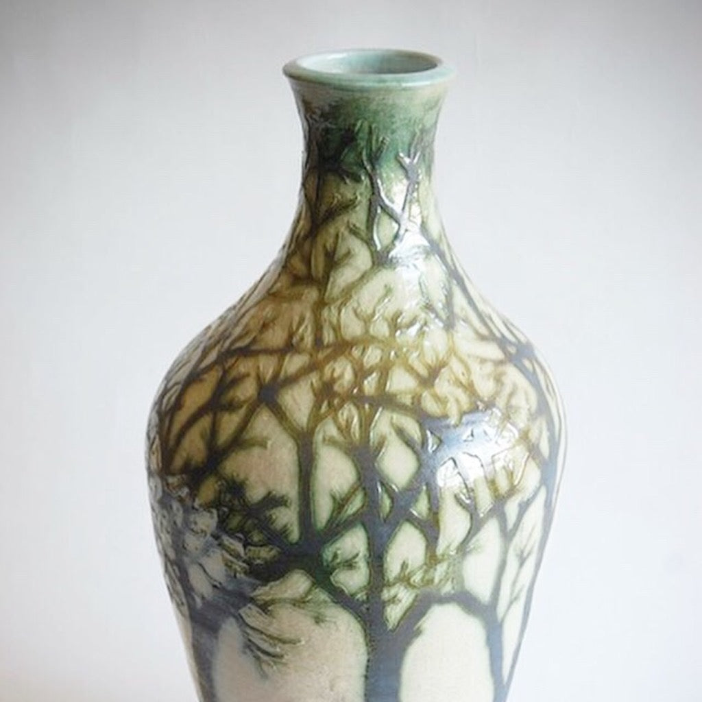 Stoneware ceramic handmade engraved vase with woodland design